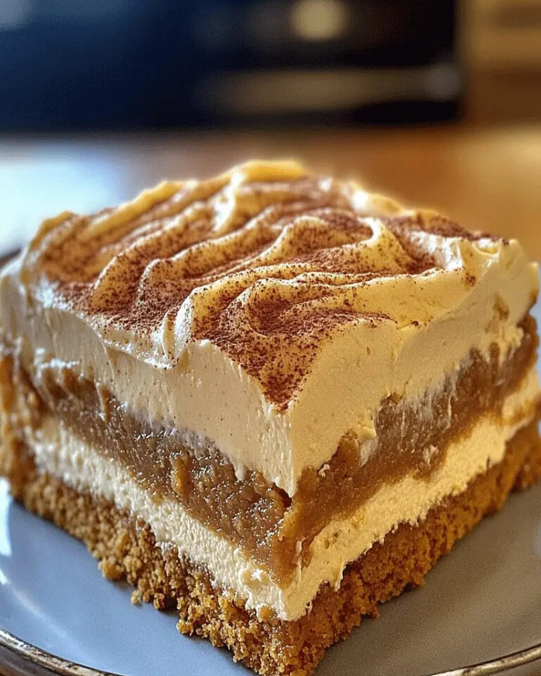 Ultimate Pumpkin Spice Gooey Cake with Cream Cheese Frosting