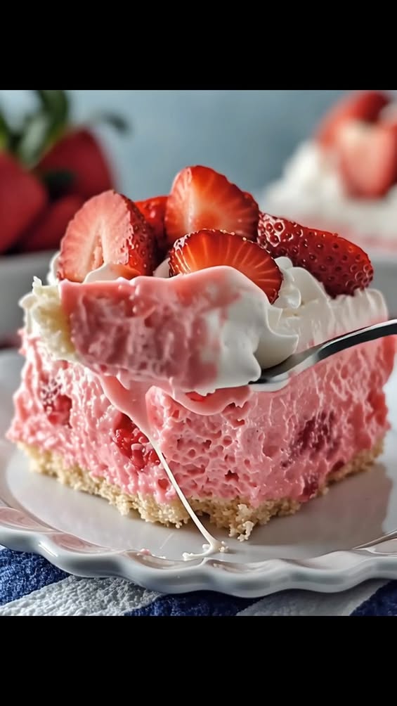 Ultimate Three Milk Cake Topped with Whipped Cream and Strawberries