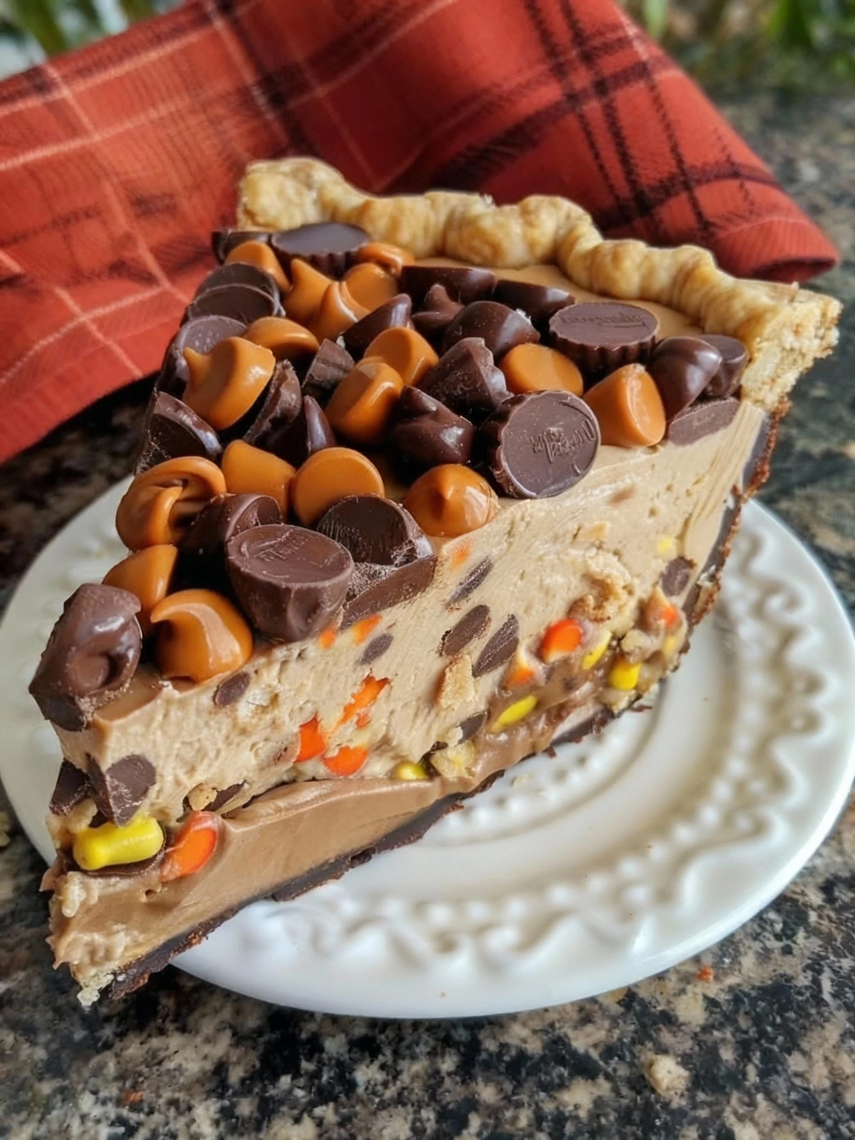 This Peanut Butter Cup Pie is a dessert game changer rich creamy and loaded with the classic combo of peanut butter finished