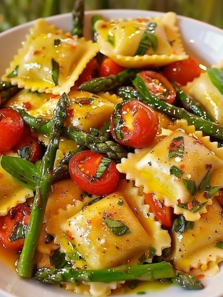 Ravioli with Tomatoes, Asparagus, Garlic, and Herbs Recipe