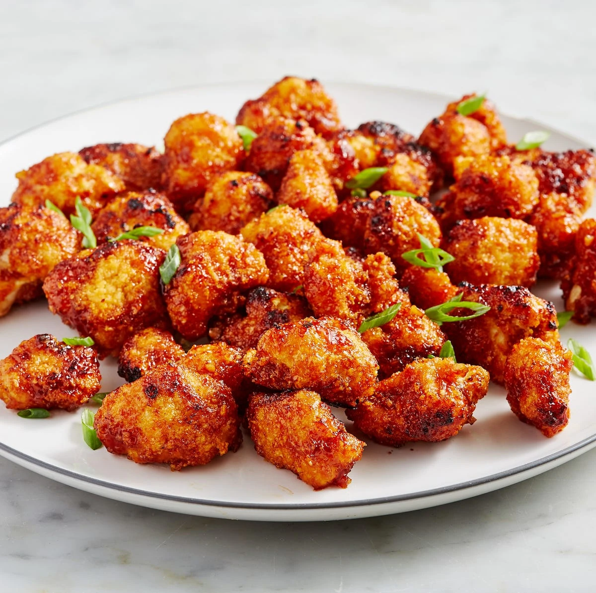 Honey-Garlic Cauliflower Is The Vegetarian App Your Super Bowl Needs or This Honey-Garlic Cauliflower Is SO AddictiveDelish finished